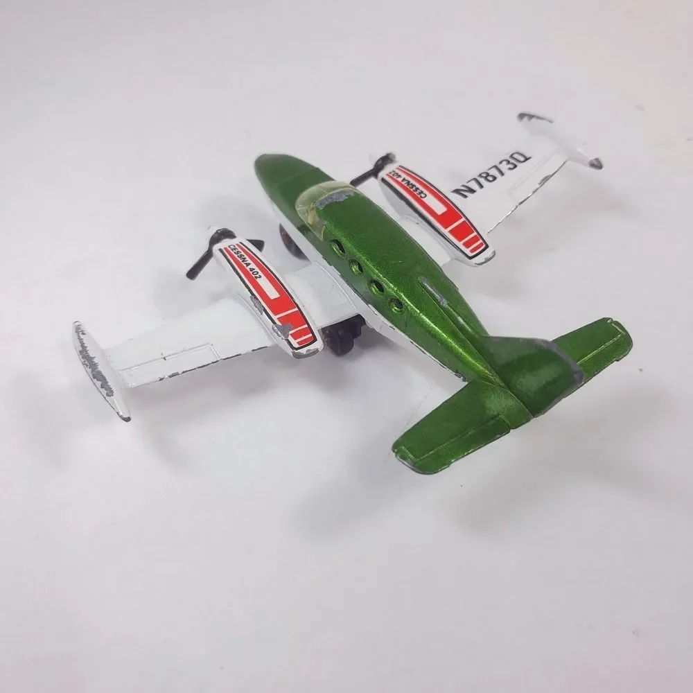 MATCHBOX Sky Busters 1974 SP9 Cessna 402 plane Airplane Macau Diecast green